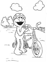 elmo va en bicicleta